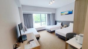 Μια τηλεόραση ή/και κέντρο ψυχαγωγίας στο Grand Bay View Hotel