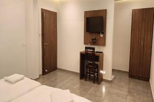 Postel nebo postele na pokoji v ubytování Green Tea Hotels