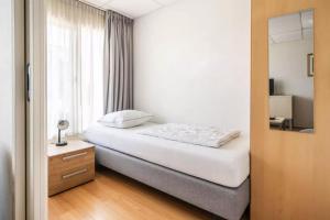 Ένα ή περισσότερα κρεβάτια σε δωμάτιο στο Ooststraat 25