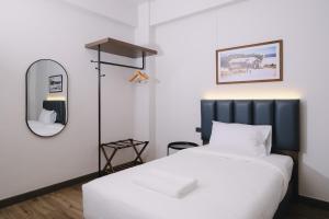 Postel nebo postele na pokoji v ubytování Raya Hotel Krabi