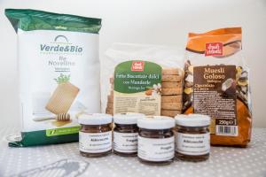 a group of food items sitting on a shelf at Bianco Nuvola in Montecchio +23 photos