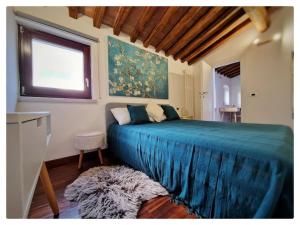Postel nebo postele na pokoji v ubytování Vicolo Bugliolo 10 - HOME B&B