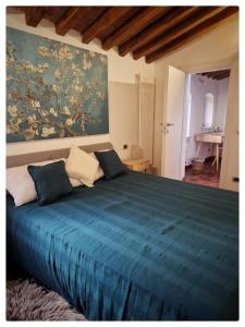 Postel nebo postele na pokoji v ubytování Vicolo Bugliolo 10 - HOME B&B + 9 fotografií