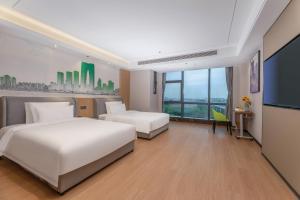 Nuotrauka iš apgyvendinimo įstaigos Yilong Michael International Hotel Suzhou Industrial Park Nanhuanqiao Market Branch mieste Jiangtian galerijos