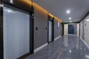 Fotografie z fotogalerie ubytování Yilong Michael International Hotel Suzhou Industrial Park Nanhuanqiao Market Branch v destinaci Jiangtian
