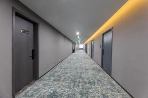 Fotografie z fotogalerie ubytování Yilong Michael International Hotel Suzhou Industrial Park Nanhuanqiao Market Branch v destinaci Jiangtian