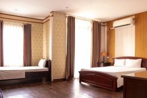 Ένα ή περισσότερα κρεβάτια σε δωμάτιο στο HomeTown Cha Hotel
