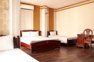 Ένα ή περισσότερα κρεβάτια σε δωμάτιο στο HomeTown Cha Hotel