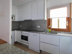 Kuchyň nebo kuchyňský kout v ubytování Apartamentos 3000 Formigal