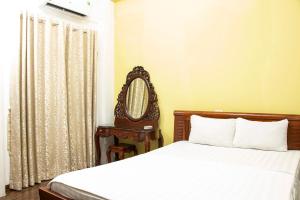 Ένα ή περισσότερα κρεβάτια σε δωμάτιο στο HomeTown Cha Hotel