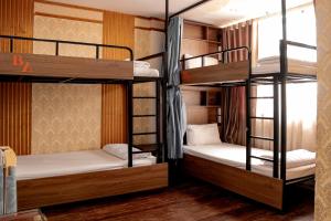 Ένα ή περισσότερα κρεβάτια σε δωμάτιο στο HomeTown Cha Hotel