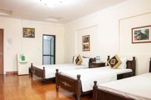 Ένα ή περισσότερα κρεβάτια σε δωμάτιο στο HomeTown Cha Hotel