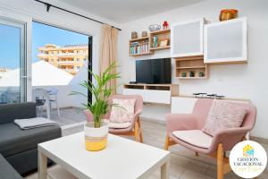 Televízia a/alebo spoločenská miestnosť v ubytovaní Marina Primavera Heated Pool Free Wifi