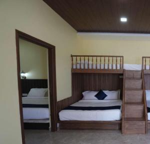 Postel nebo postele na pokoji v ubytování Coastal Grand Resorts - Akshaya