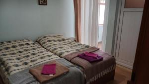 Postel nebo postele na pokoji v ubytování Bujtina (Pension) Oltas