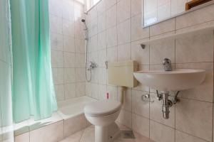 Kúpeľňa v ubytovaní Apartments Ruze + 34 fotografií