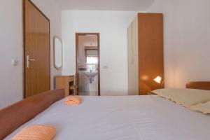 Posteľ alebo postele v izbe v ubytovaní Apartments Ruze