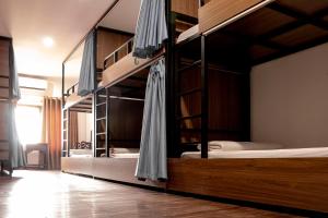 Ένα ή περισσότερα κρεβάτια σε δωμάτιο στο HomeTown Cha Hotel