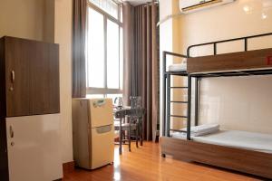 Ένα ή περισσότερα κρεβάτια σε δωμάτιο στο HomeTown Cha Hotel