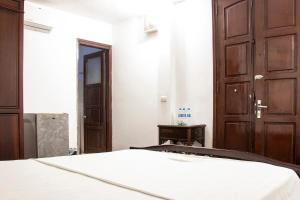 Ένα ή περισσότερα κρεβάτια σε δωμάτιο στο HomeTown Cha Hotel