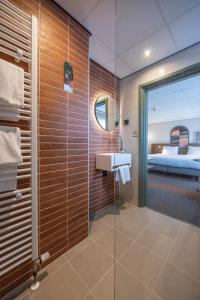 Koupelna v ubytování Fletcher Boutique Hotel De Mallejan