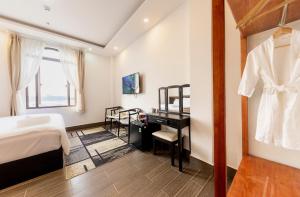 Postel nebo postele na pokoji v ubytování Olagi Hotel 2