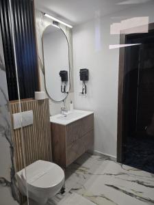 Koupelna v ubytování Hotel Yarus