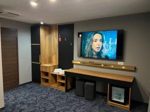 TV a/nebo společenská místnost v ubytování Hotel Yarus