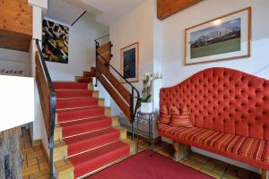 Uma área de estar em Hotel Tiroler Stuben