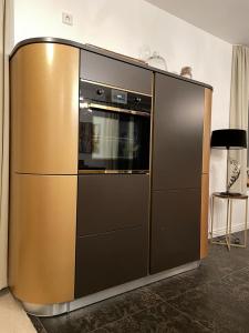 a large stainless steel oven in a kitchen at Penthouse Traum - Blick über Arnstadt in Arnstadt +10 photos