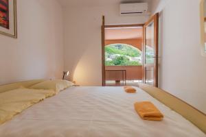 Posteľ alebo postele v izbe v ubytovaní Apartments Ruze