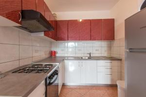 Kuchyňa alebo kuchynka v ubytovaní Apartments Ruze