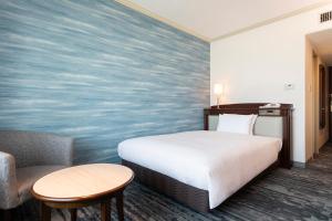 Кровать или кровати в номере Hotel Nikko Kansai Airport - 3 mins walk to the airport