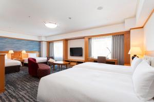 Кровать или кровати в номере Hotel Nikko Kansai Airport - 3 mins walk to the airport