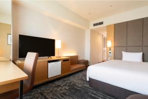 Кровать или кровати в номере Hotel Nikko Kansai Airport - 3 mins walk to the airport