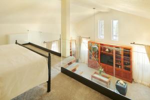 a bedroom with a bed and a glass wall at Villa Diocletian's Palace in Supetar +31 photos