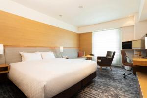 Кровать или кровати в номере Hotel Nikko Kansai Airport - 3 mins walk to the airport