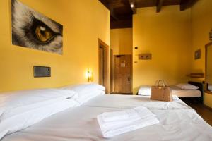 Posteľ alebo postele v izbe v ubytovaní Hotel Angelica