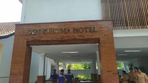 a group of people standing in front of a hotel at Giri Kusuma Hotel Payangan in Payangan