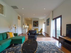Khu vực ghế ngồi tại Loft frica Villas Cruz Mayor