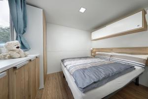 Postel nebo postele na pokoji v ubytování Albatross Mobile Homes on Camping Eden