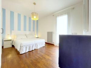 Postel nebo postele na pokoji v ubytování Al Belvedere