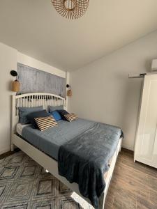 Postel nebo postele na pokoji v ubytování Hostal Orange Vibes