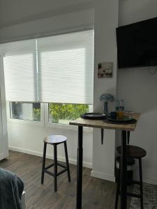 TV a/nebo společenská místnost v ubytování Hostal Orange Vibes