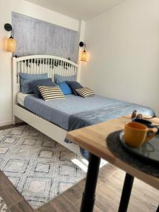 Postel nebo postele na pokoji v ubytování Hostal Orange Vibes