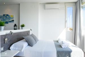 Posteľ alebo postele v izbe v ubytovaní Beach Apartment Guadalmar + 20 fotografií