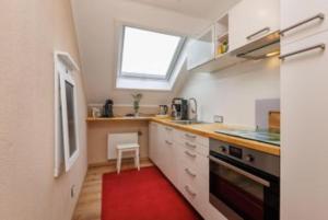 Kuchyň nebo kuchyňský kout v ubytování Ferienwohnung Ankel