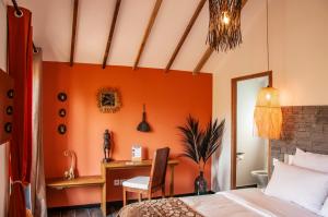 Postel nebo postele na pokoji v ubytování Heritage Ecolodge