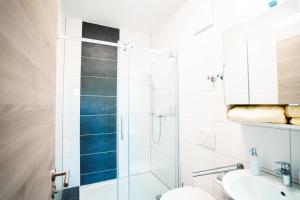 Koupelna v ubytování Hotel am Schafbaum