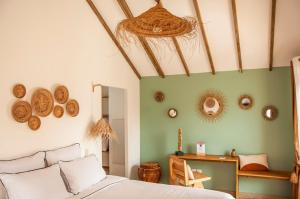 Postel nebo postele na pokoji v ubytování Heritage Ecolodge